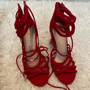 Brand new red heeled sandals